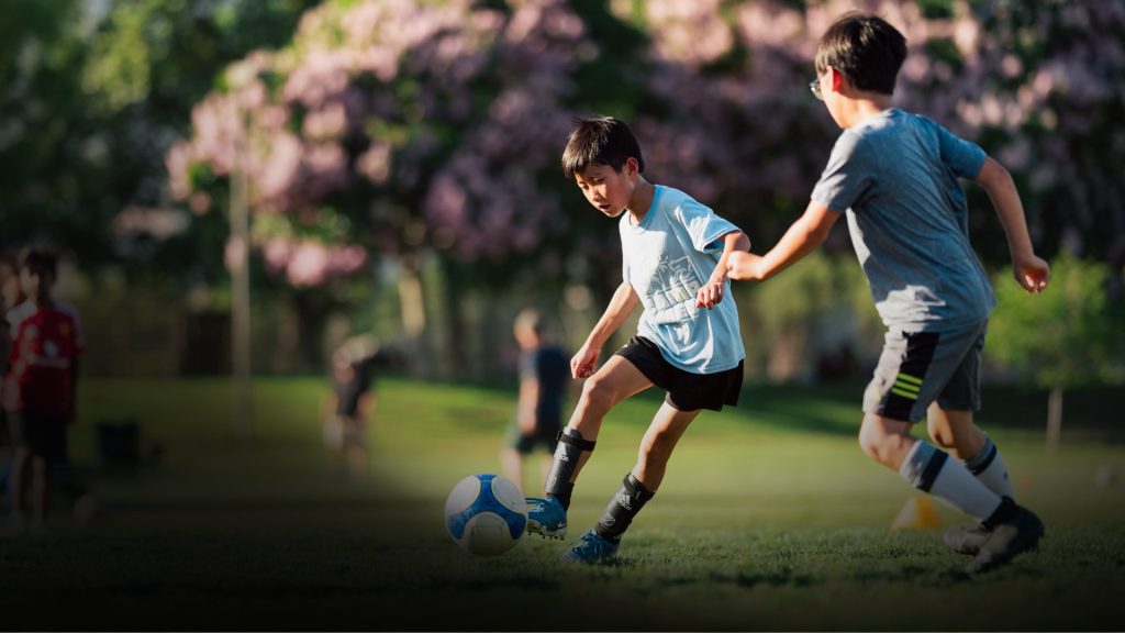 Young soccer players in action during an FTBL Academy practice session.